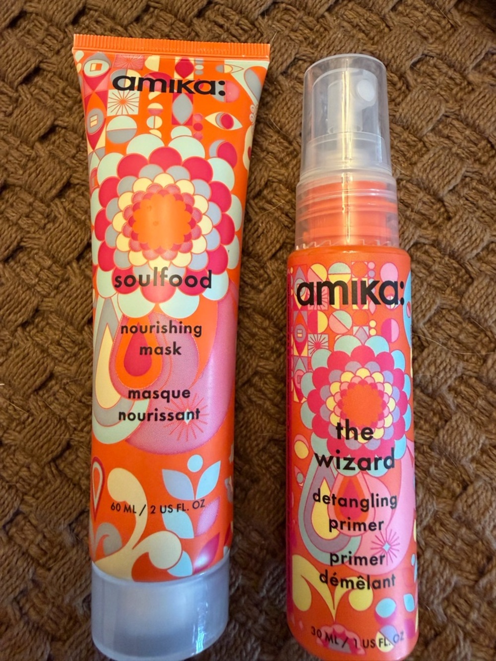 amika The Wizard Detangling Primer - Orange Floral Bottle